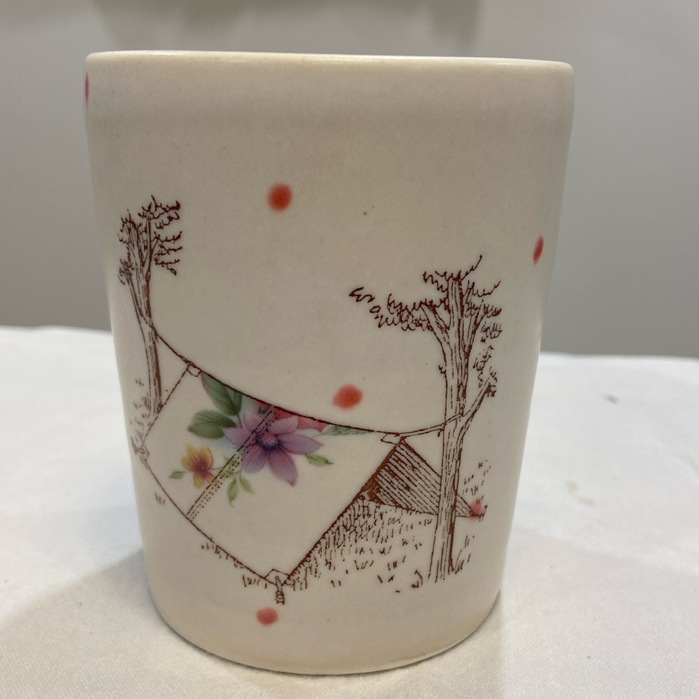 Ceramic tea mug - tent, flower and trees. Signed.